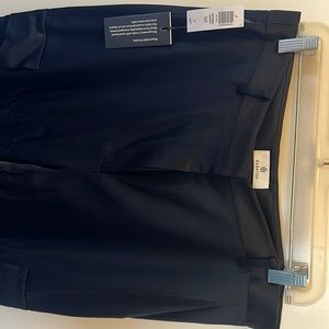 Aritzia refined satin cargo pants in black.